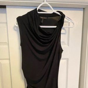 BCBG asymetric sleeveless black top. Size small.